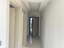 2+1 Ground Floor Apartment For Sale With Elevator In The Market Center Of Gumuldur