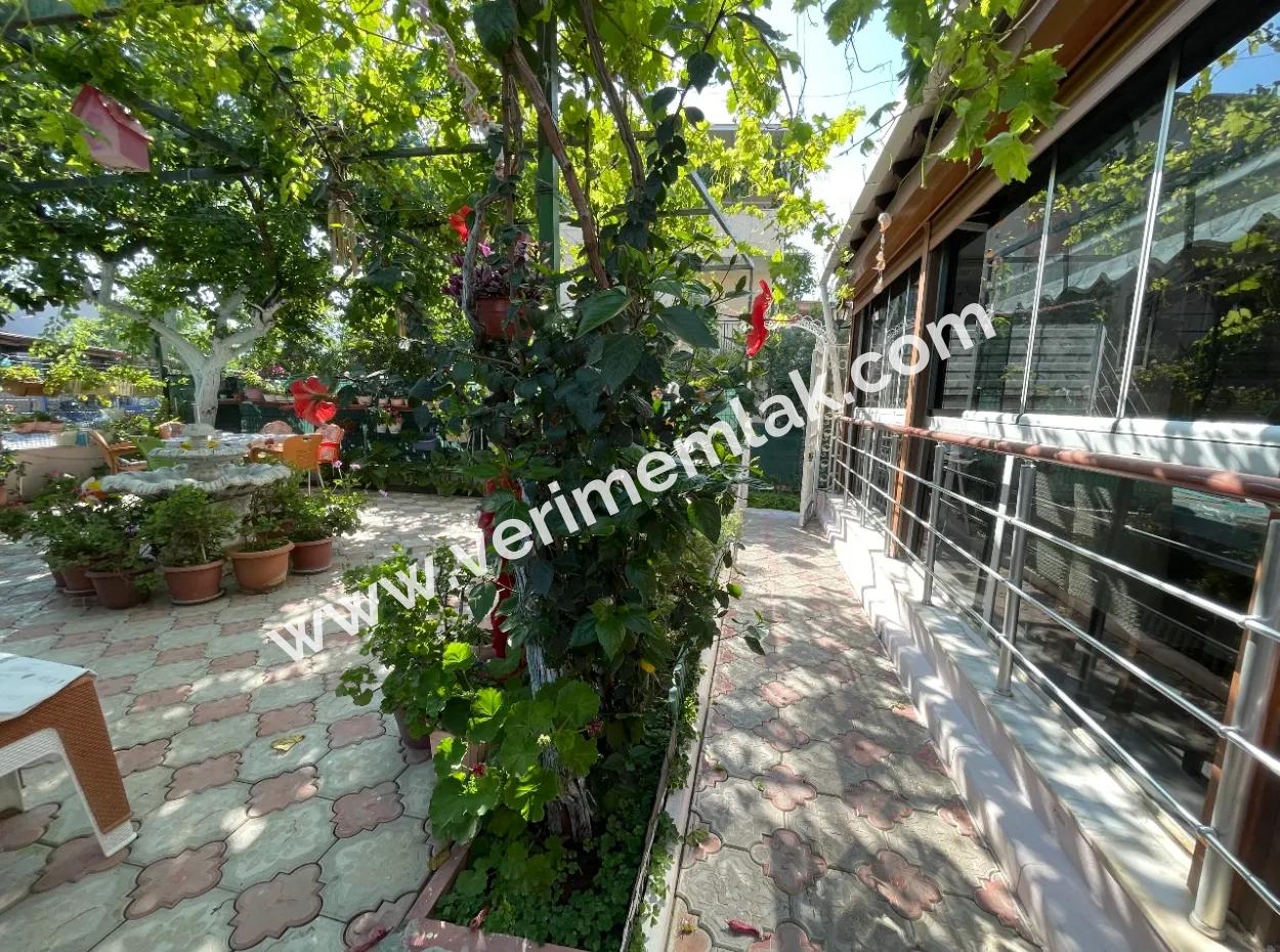 2 1 Apartment For Sale In Ürkmez With 350Mt Garden To The Sea In The Center