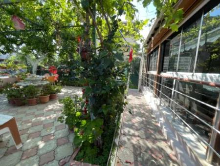 2 1 Apartment For Sale In Ürkmez With 350Mt Garden To The Sea In The Center