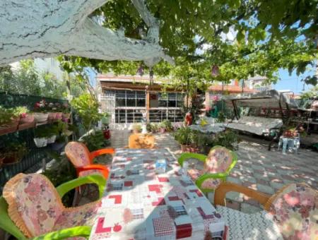 2 1 Apartment For Sale In Ürkmez With 350Mt Garden To The Sea In The Center