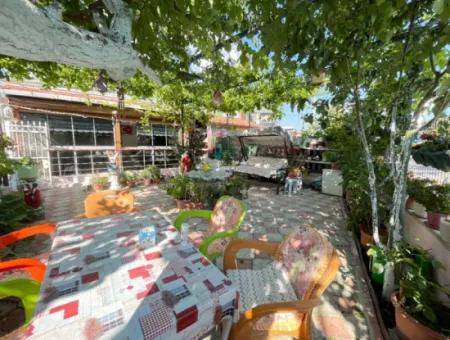 2 1 Apartment For Sale In Ürkmez With 350Mt Garden To The Sea In The Center