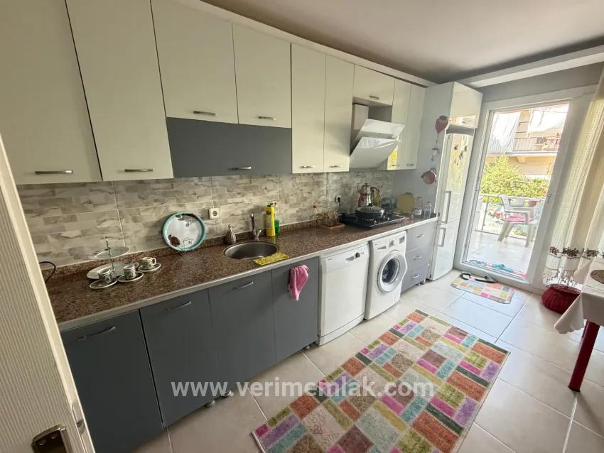В Сеферихисаре Бенгилере, в 350м от моря, продается 2+1 квартира с широким садом и фруктовыми деревьями!