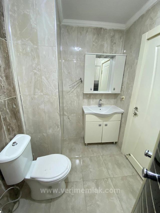 Квартира 3+1 На Первом Этаже На Продажу В Районе Сеферихисар-Уркмез, В 100 Метрах От Моря