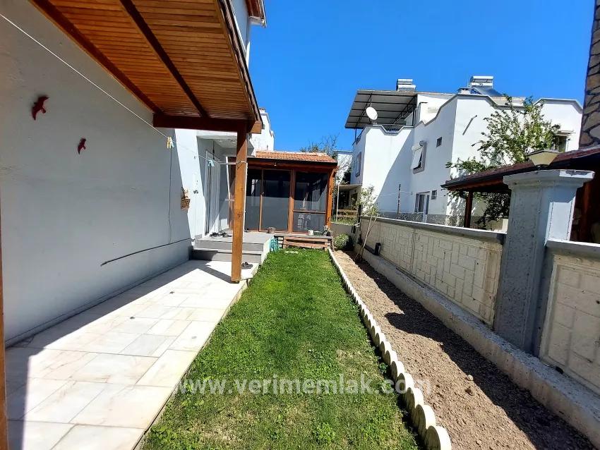 Seferihisar Doğanbey'de bahçeli deniz manzaralı satılık 4+1 villa –