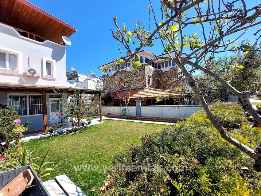 Seferihisar Doğanbey'de bahçeli deniz manzaralı satılık 4+1 villa –