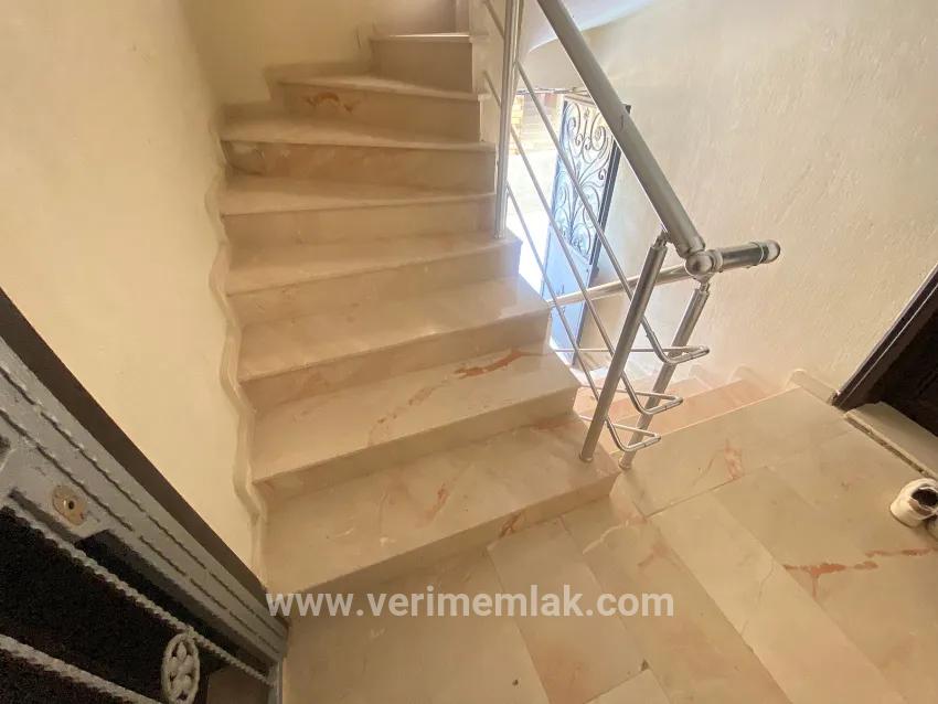 Seferihisar Mersin Alanı'nda denize 400m sıfır eşyalı bahçe katı satılık 2+1 daire