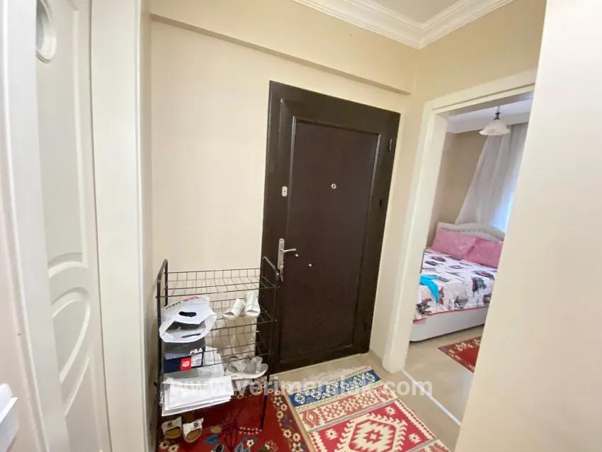 Seferihisar Mersin Alanı'nda denize 400m sıfır eşyalı bahçe katı satılık 2+1 daire