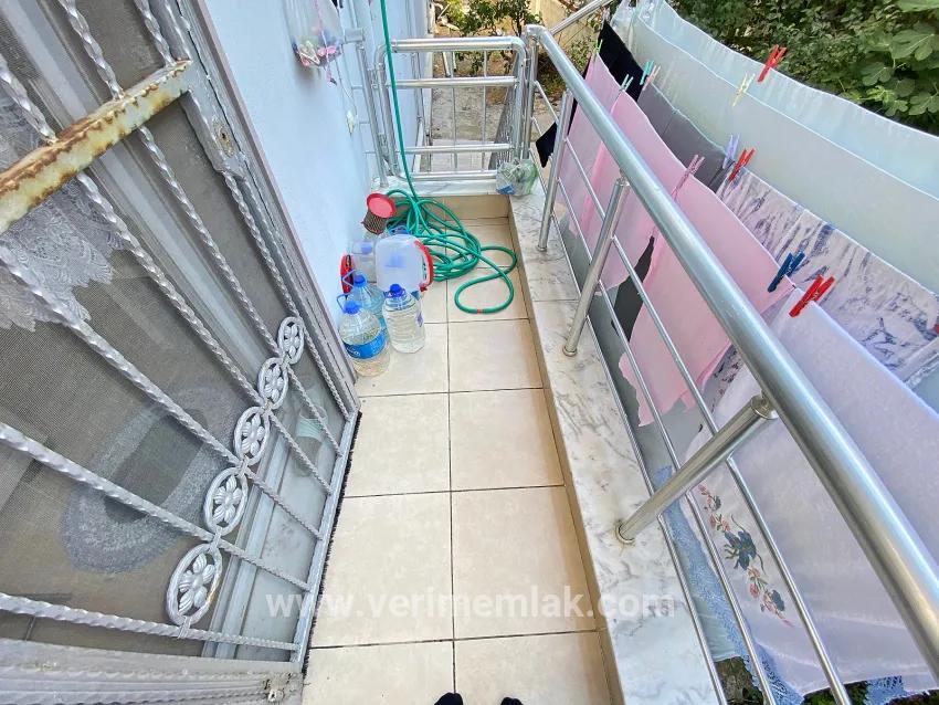 Seferihisar Mersin Alanı'nda denize 400m sıfır eşyalı bahçe katı satılık 2+1 daire