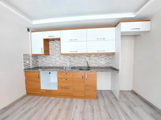 İzmir Seferihisar Ürkmez'de Satılık Bahçeli Zemin Kat Daire 2+1