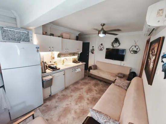 Gümüldür Sahilde 1+1 50 m2 eşyalı uygun fiyata satılık daire