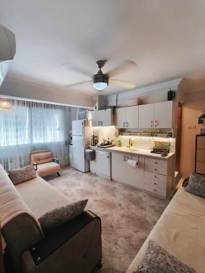 Gümüldür Sahilde 1+1 50 m2 eşyalı uygun fiyata satılık daire