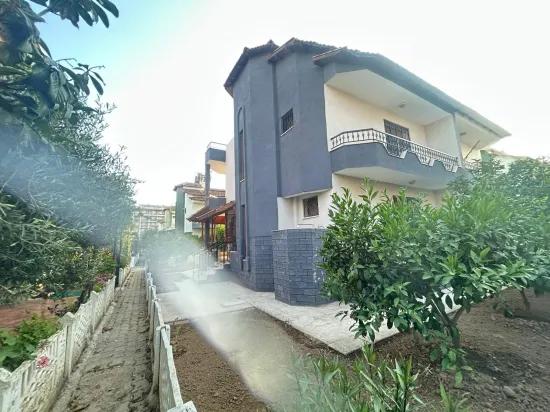 Gümüldür'de denize 100m site İçerisinde geniş bahçeli satılık 4+1 villa