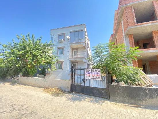 Seferihisar Mersin Alanı'nda denize 400m sıfır eşyalı bahçe katı satılık 2+1 daire