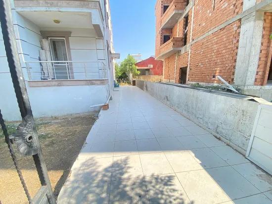 Seferihisar Mersin Alanı'nda denize 400m sıfır eşyalı bahçe katı satılık 2+1 daire
