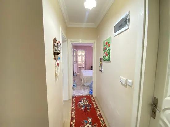 Seferihisar Mersin Alanı'nda denize 400m sıfır eşyalı bahçe katı satılık 2+1 daire