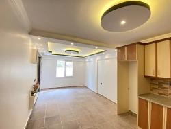 Seferihisar Mersin Alanı'nda Asansörlü Denize 50M! Modern Mimarili Satılık 1+1 Daire